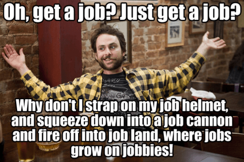 Charlie Day, wearing a checkered shirt, holds up hands to say: "Oh, get a job? Just get a job?"